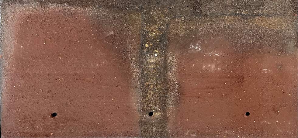 Die kreative Klinkerplatte CRADLETOP Fassadengold mit natürlicher Oberfläche in rotbraun